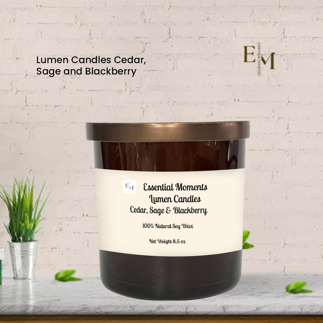 Lumen Candles Cedar, Sage and Blackberry candle with label on a white brick background